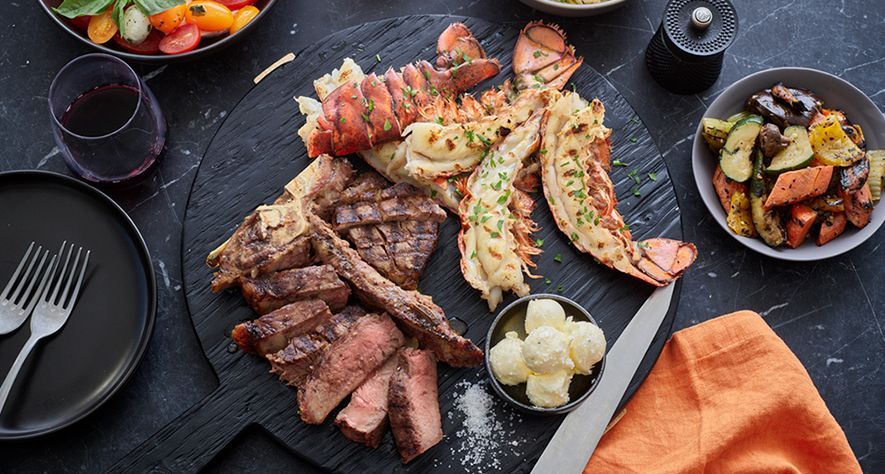 Recipes: Grilled Porterhouse Steak with Lobster Tails and Truffle Butter