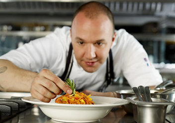 Chef making a dish